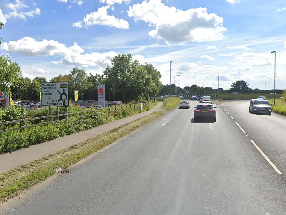 Car and motorbike crash near busy York roundabout
