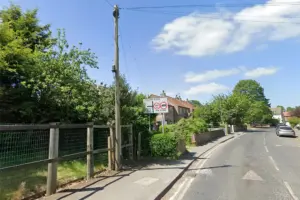 Driver injured after vehicle hits street light and telegraph pole