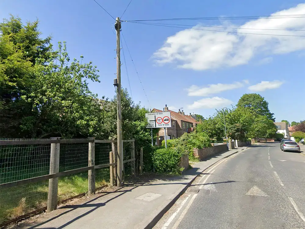 Driver injured after vehicle hits street light and telegraph pole