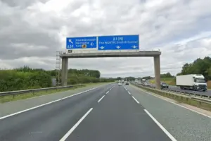 Occupants trapped after BMW crashes into ditch of A1M