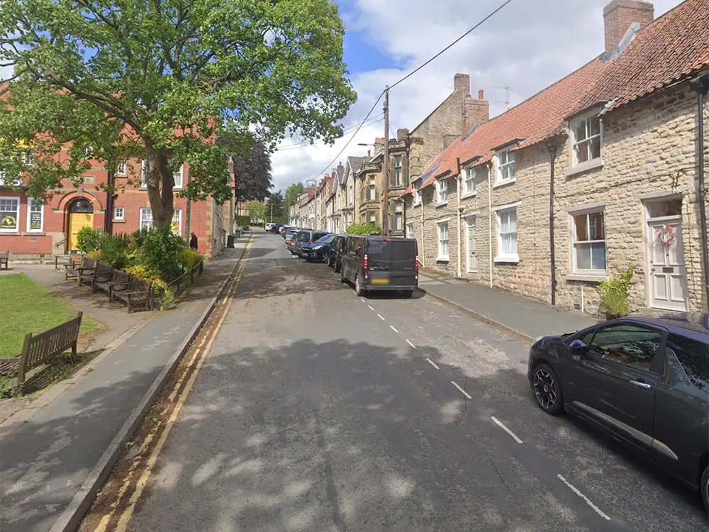 Vandals damage doors and frighten residents on Pickering street