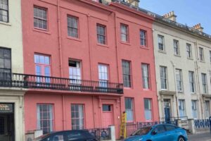 Hotel painted pink without permission after a mix-up with the paperwork