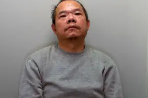 Chinese criminal pulled through window during surreal police raid in North Yorkshire village