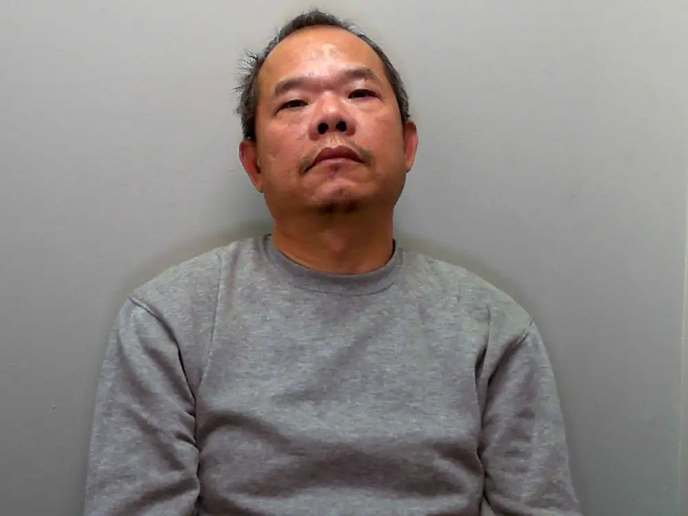 Chinese criminal pulled through window during surreal police raid in North Yorkshire village