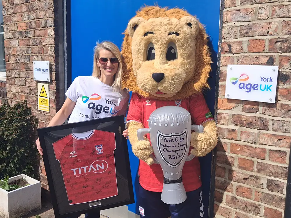 Signed and framed York City shirt goes on sale to raise money for local charity