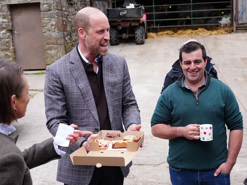 Pix: Prince William meets well wishers and tucks into cake on trip to North Yorkshire