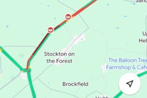 A number of vehicles involved in a collision on the A64
