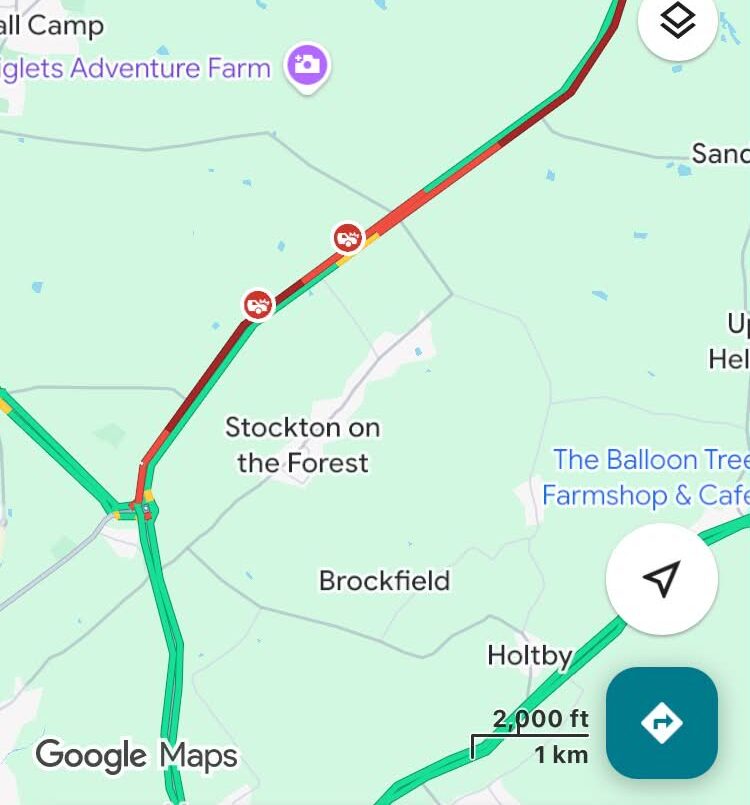 A number of vehicles involved in a collision on the A64