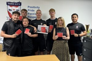 York City FC Foundation and IDAS  show domestic abuse the red card During the World Cup