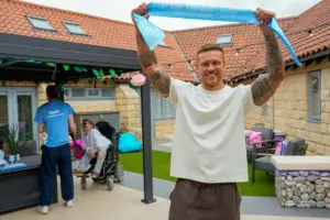 Love Island star opens new charity courtyard inspired by the hit TV show