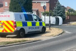Car left on its side after crash on main York road