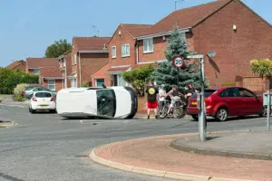 Car left on its side after crash on main York road