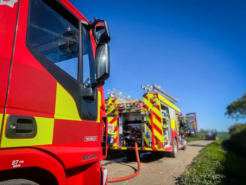 Crews tackle field blaze close to industrial estate