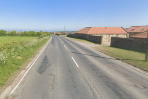 Firefighters cut casualty from wreckage after crash near Whitby