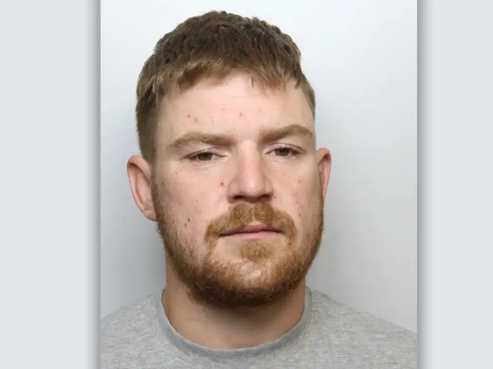Police hunt man wanted over assault