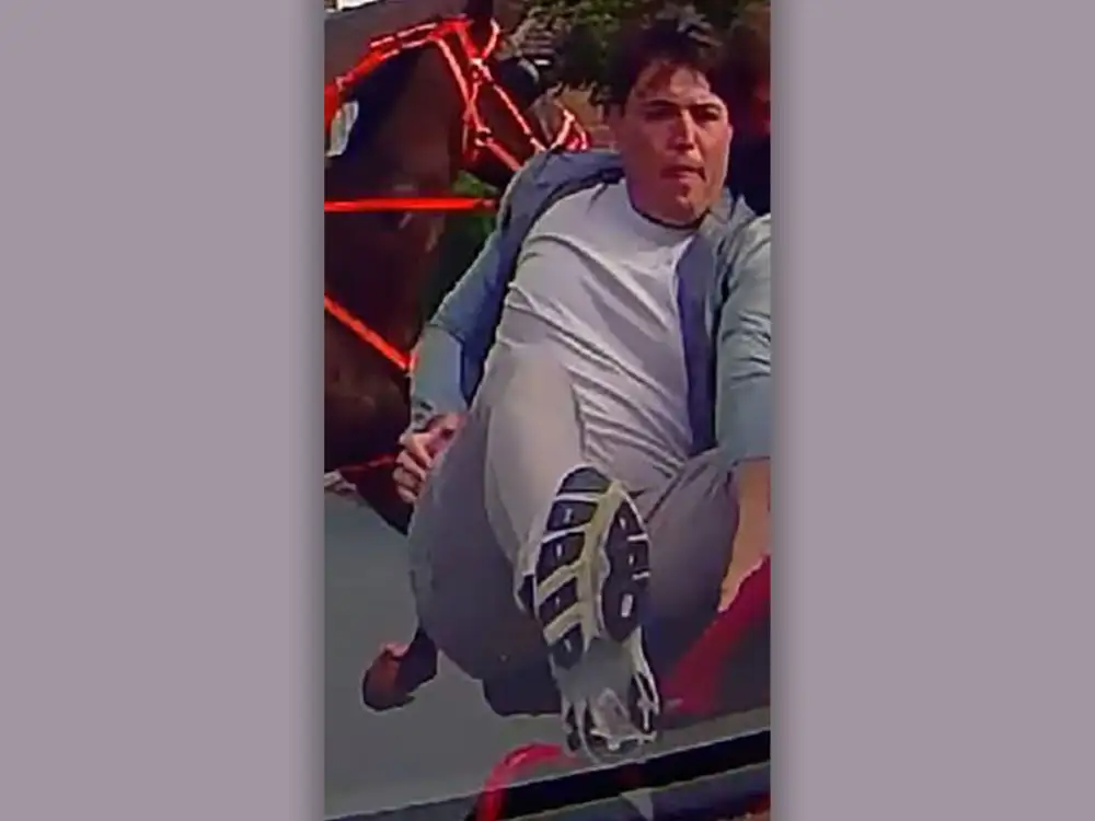 Do you know the kicking man? Image issued after car damaged in York