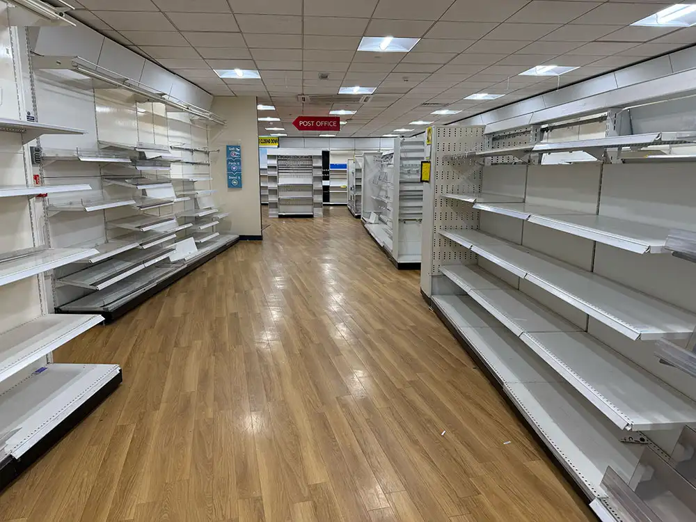 Shelves stripped bare in former flagship York store – as Post Office closes today