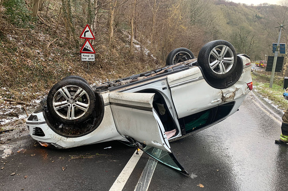 Updated: Road reopens after multi-vehicle crash leaves car on its roof